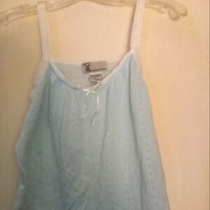 Used,not new light blue cotton/poly tiny size medium  camisole with  lace straps